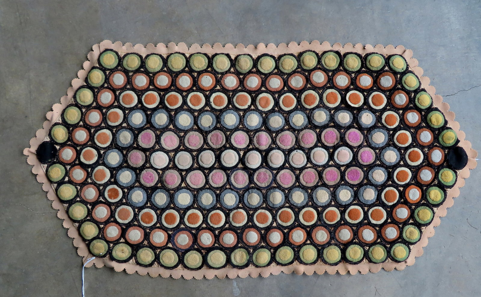 A penny table rug, 19th century. Fabric loss to 2 "pennies", else good condition. Measures 35 1/2" x (1 of 5)