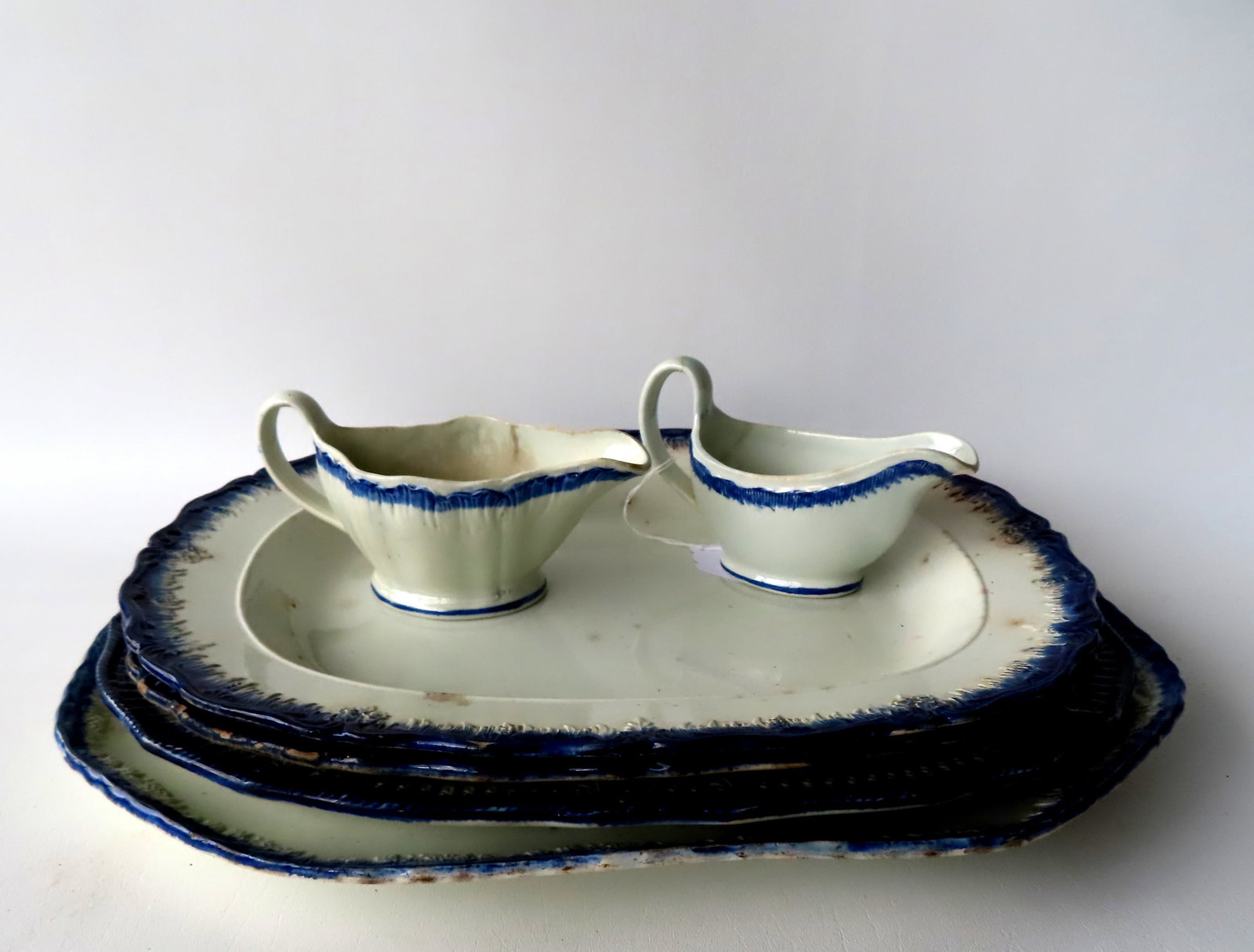 A grouping of 6 pieces of Leeds ware including 4 platters and 2 gravy boats, early to mid 19th (1 of 13)