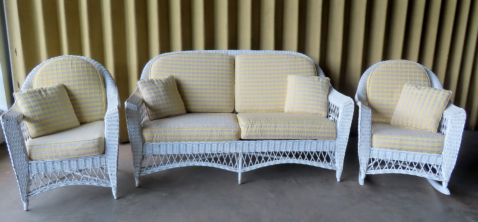 A fine 3 piece matching wicker porch set, with cushioned seats and back that appear to be newer. The (1 of 20)