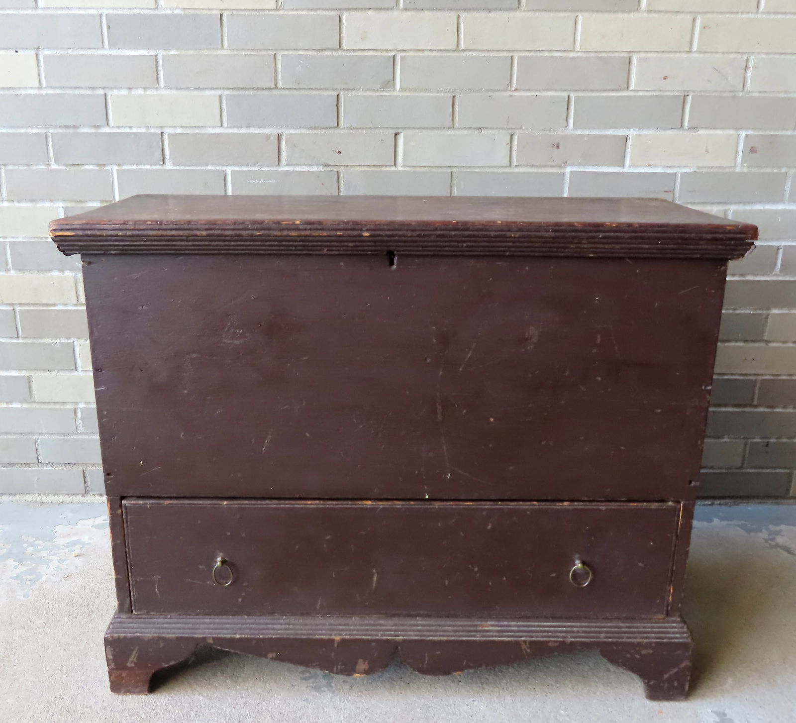 A diminutive blanket chest having a lid with a stepped molded perimeter that matches similar carved (1 of 18)