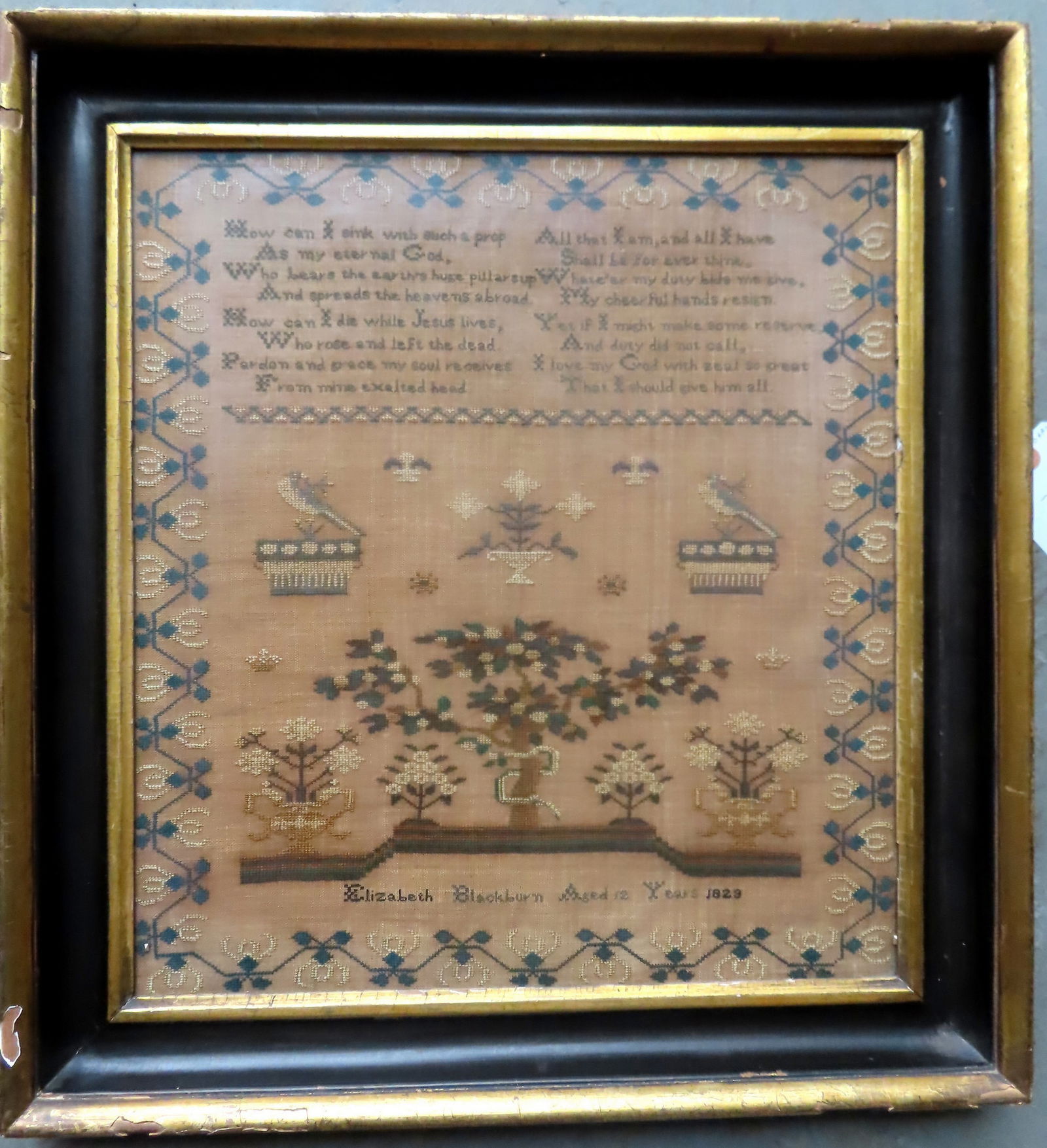 A pictorial sampler sample with religious verse, decorated with birds, trees, flowers and a fruit (1 of 10)