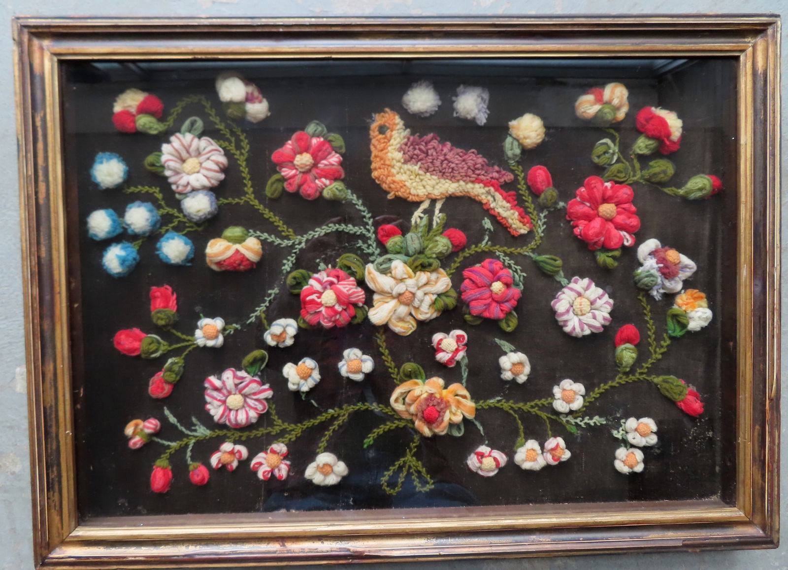 A framed embroidery of puffy textile flowers in shadow box frame, circa 1870-80. Total frame size 28 (1 of 6)