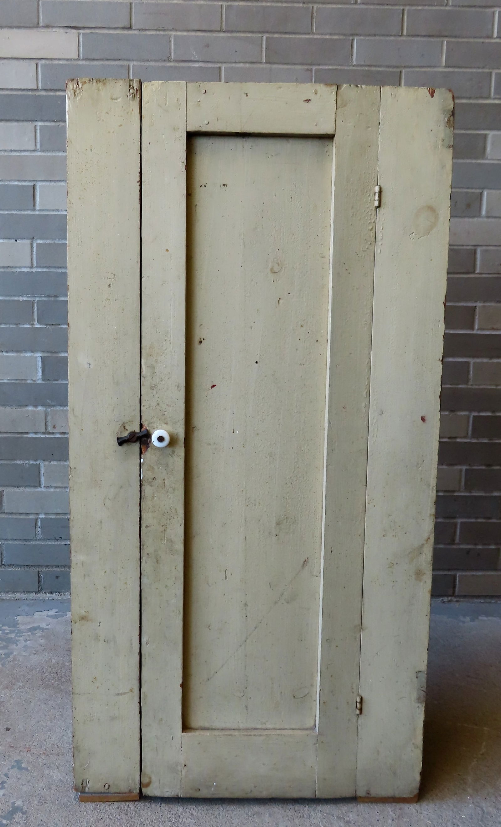 A small primitive floor cupboard with single paneled door, square nail construction, mid 19th (1 of 8)