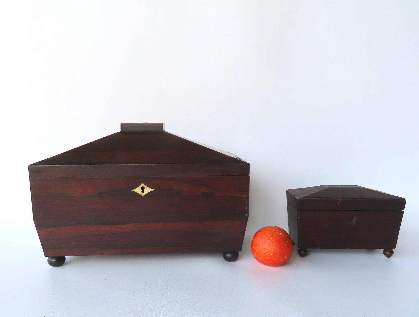 Two architectural mahogany tea caddy's on ball feet. Both with minor veneer losses, otherwise good (1 of 16)