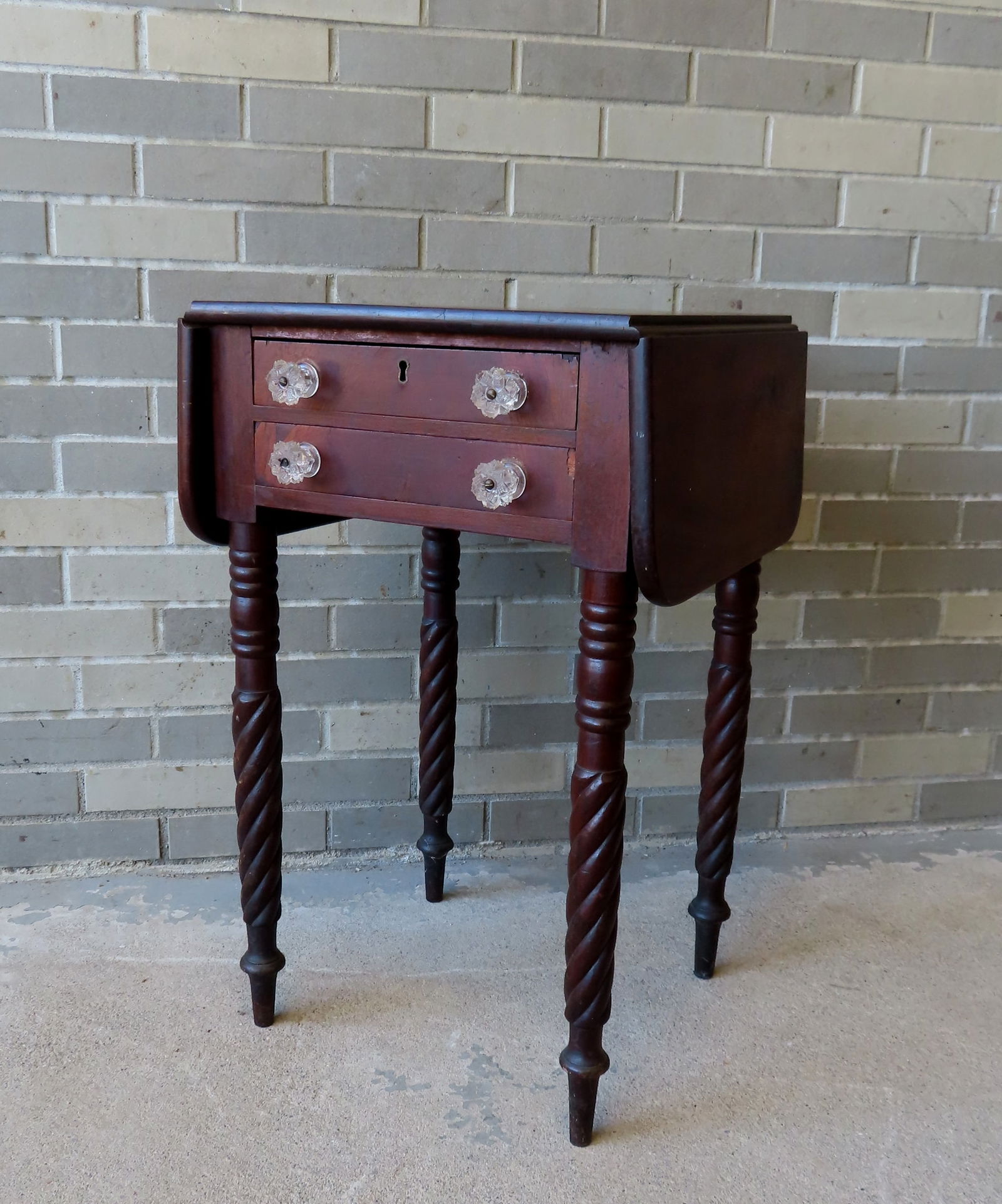 Two drawer drop leaf mahogany sewing stand with rope twist legs and sandwich glass pulls, circa (1 of 9)