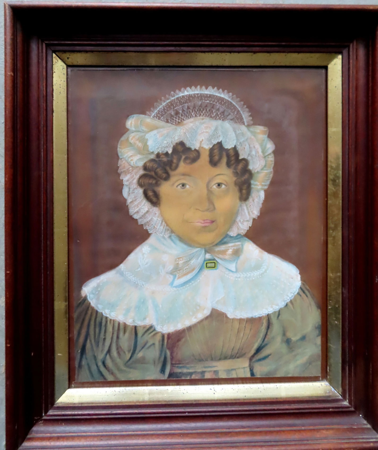 Folk art pastel portrait of a lady with brown curls wearing a lace bonnet, lace collar and green (1 of 5)