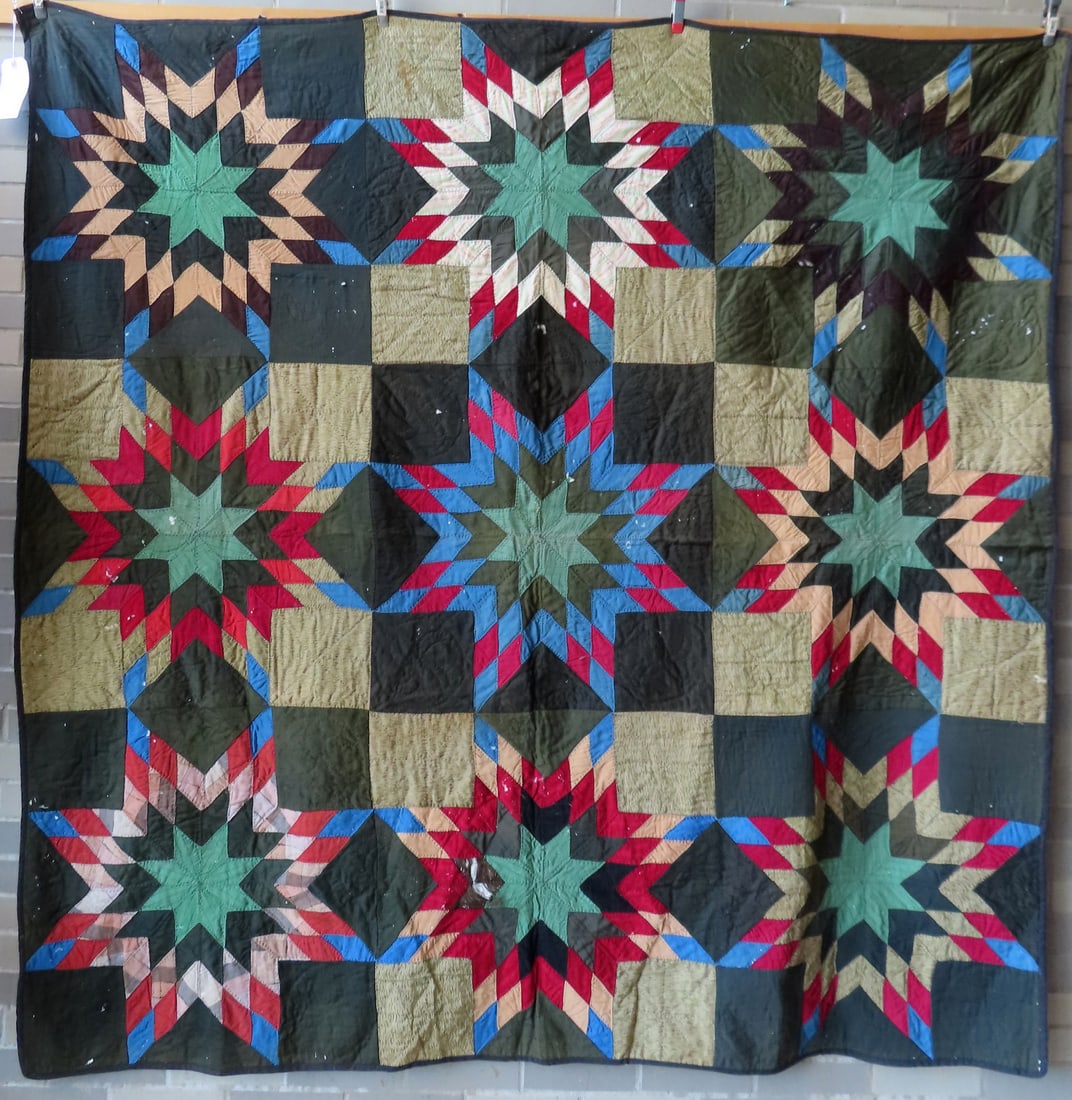 A very graphic Amish star pattern quilt, late 19th century, 74" x 75". Some scattered fabric (1 of 10)