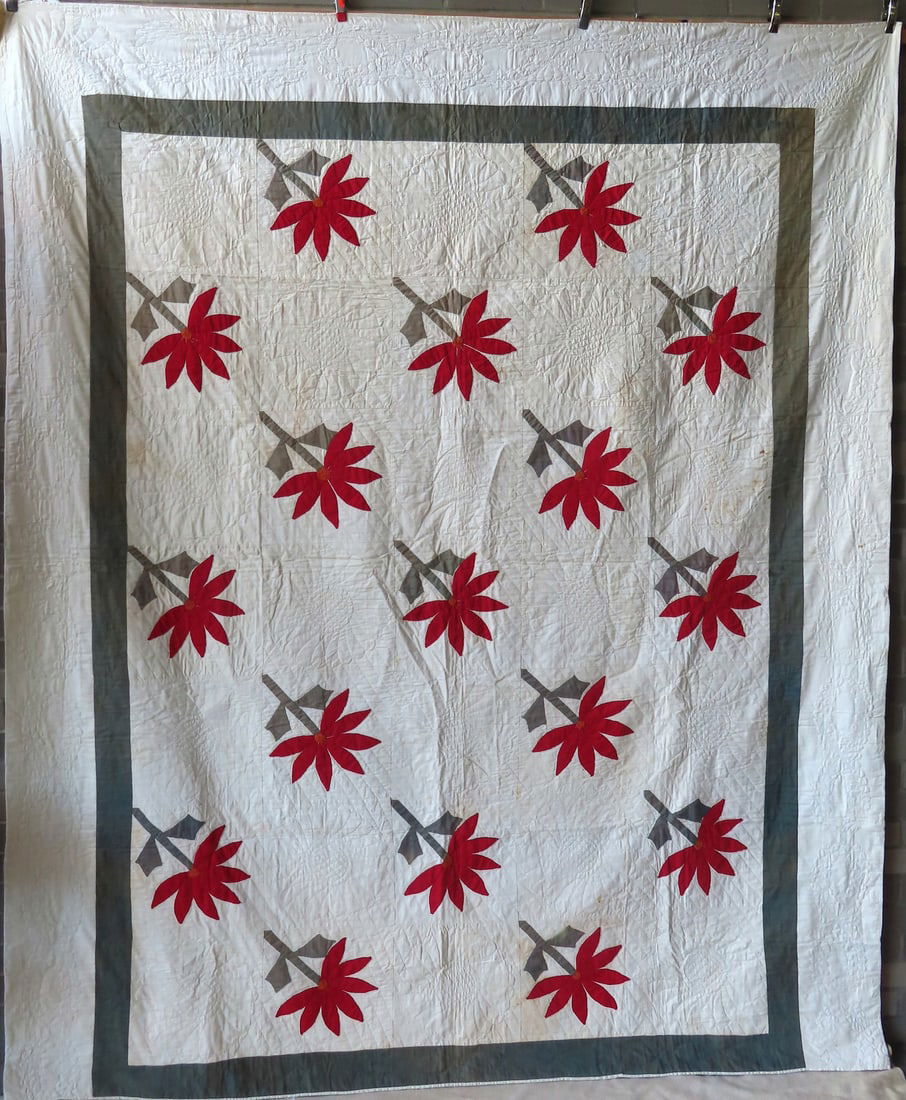 An applique quilt in a red and green floral pattern with a very fine hand stitched border, late 19th (1 of 8)