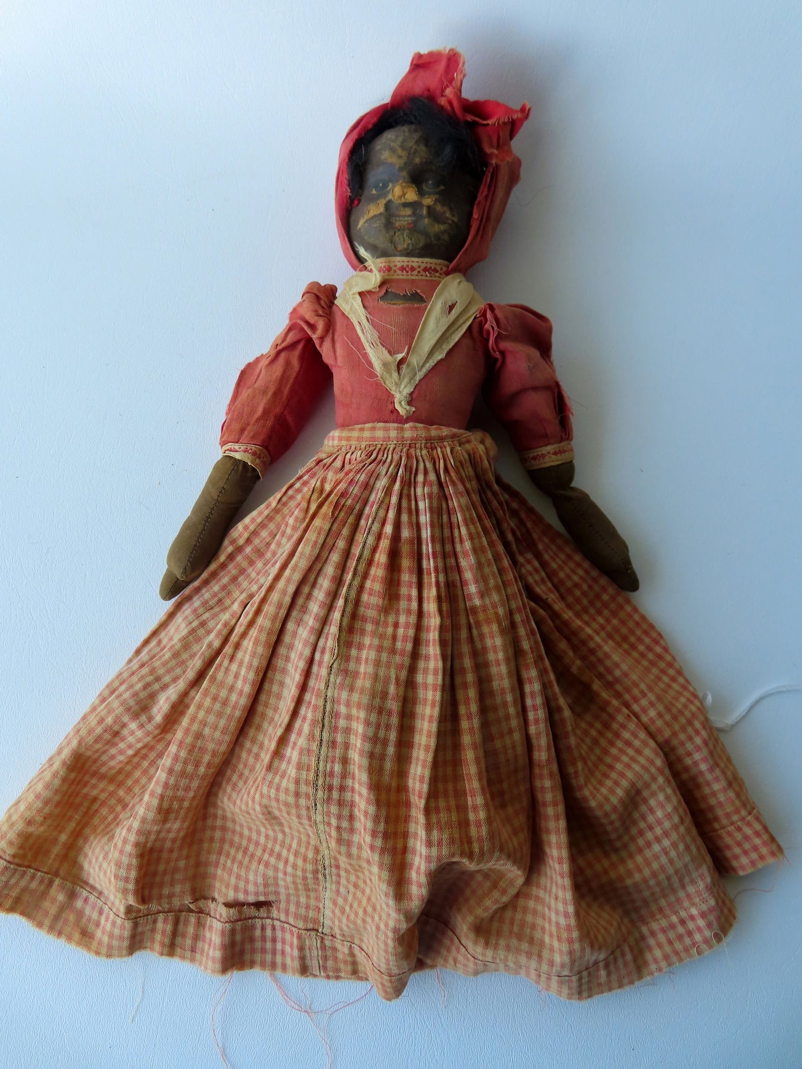 A Topsyturvy White And Black Oil Cloth Doll, Hand Painted Wear To