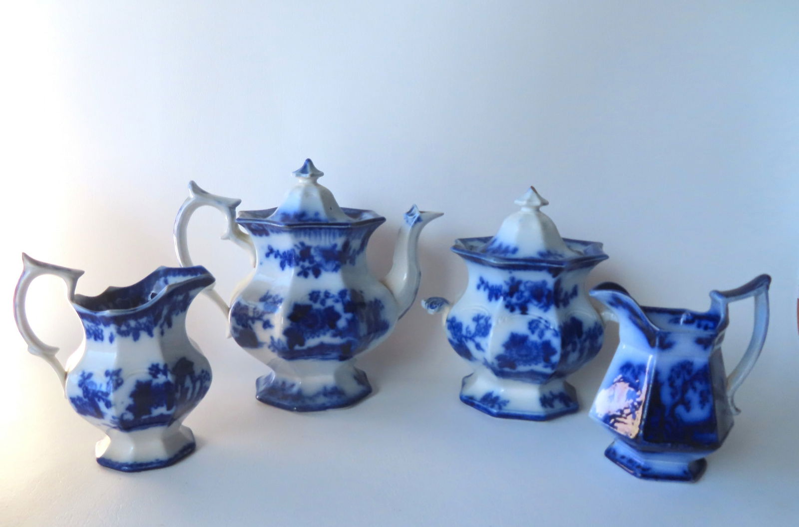 A blue and white transferware Staffordshire 3 piece porcelain tea set consisting of teapot, cover (1 of 11)