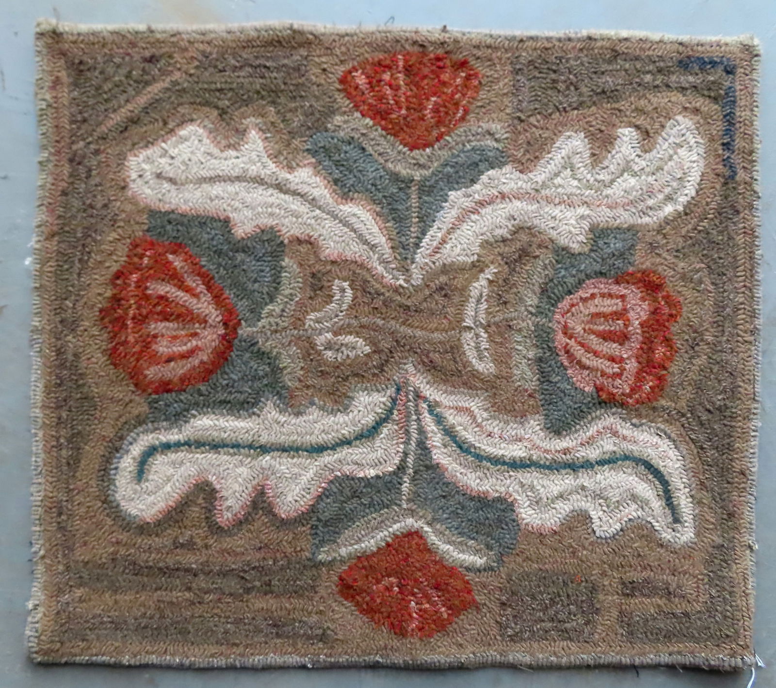 A small folk art floral hooked rug, all wool in very good unused condition, circa 1980-2010. (1 of 4)