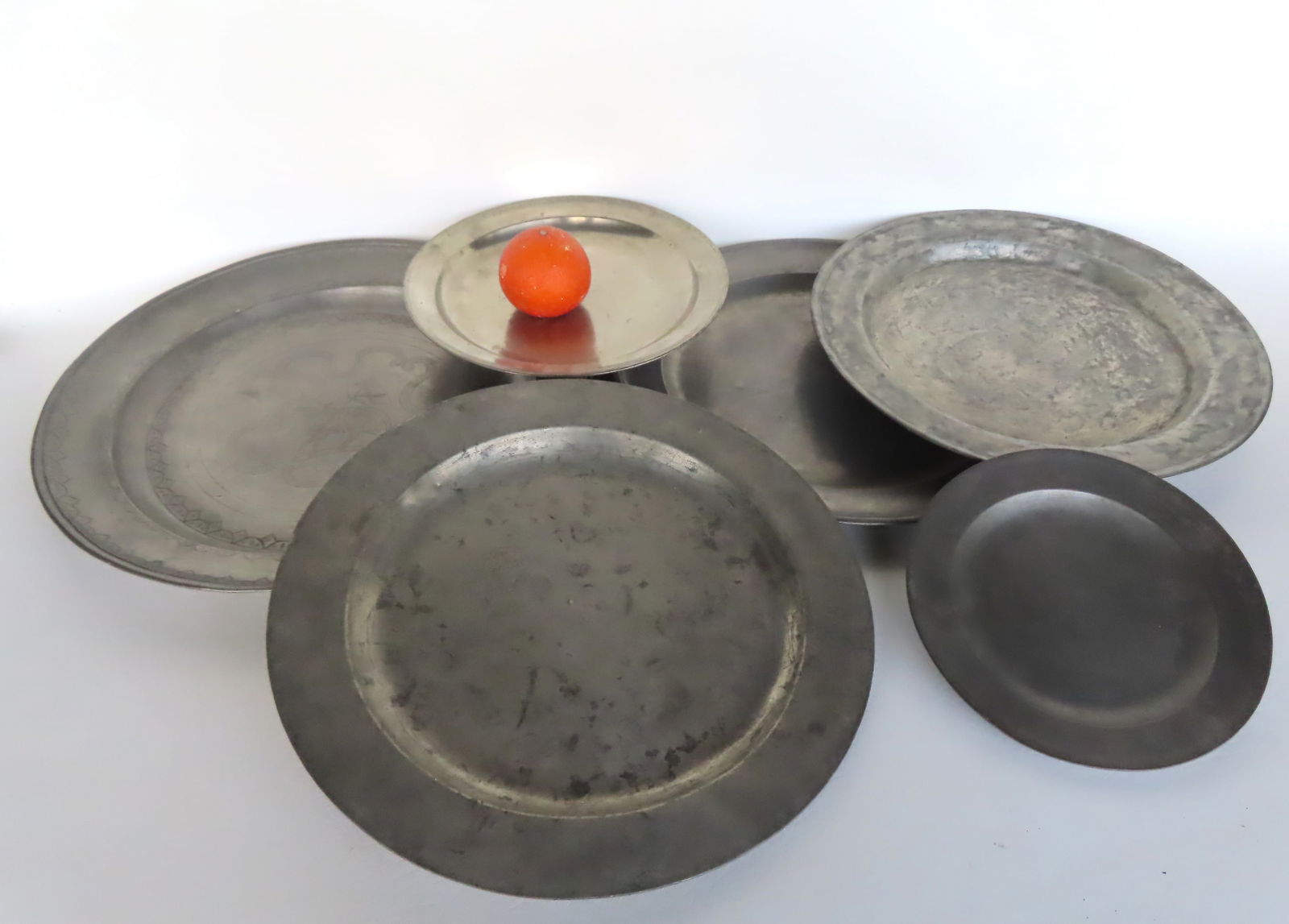 A grouping of 6 early pewter plates and chargers including: Plate signed Boardman & Co. under 2 (1 of 17)