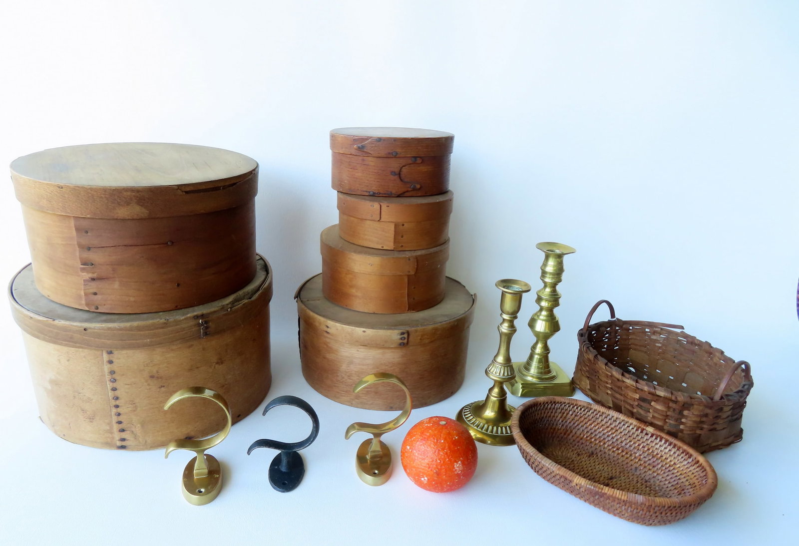 A grouping of country collectibles including: 5 pantry boxes in old finish - the smallest marked: A grouping of country collectibles including: 5 pantry boxes in old finish - the smallest marked "Cinnamon" on the lid - 4 3/4" diameter x 2 1/4"H and the largest 11 1/4" diameter x 6"H - several with