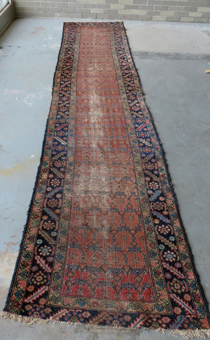 An oriental runner (carpet), late 19th century. (1 of 7)
