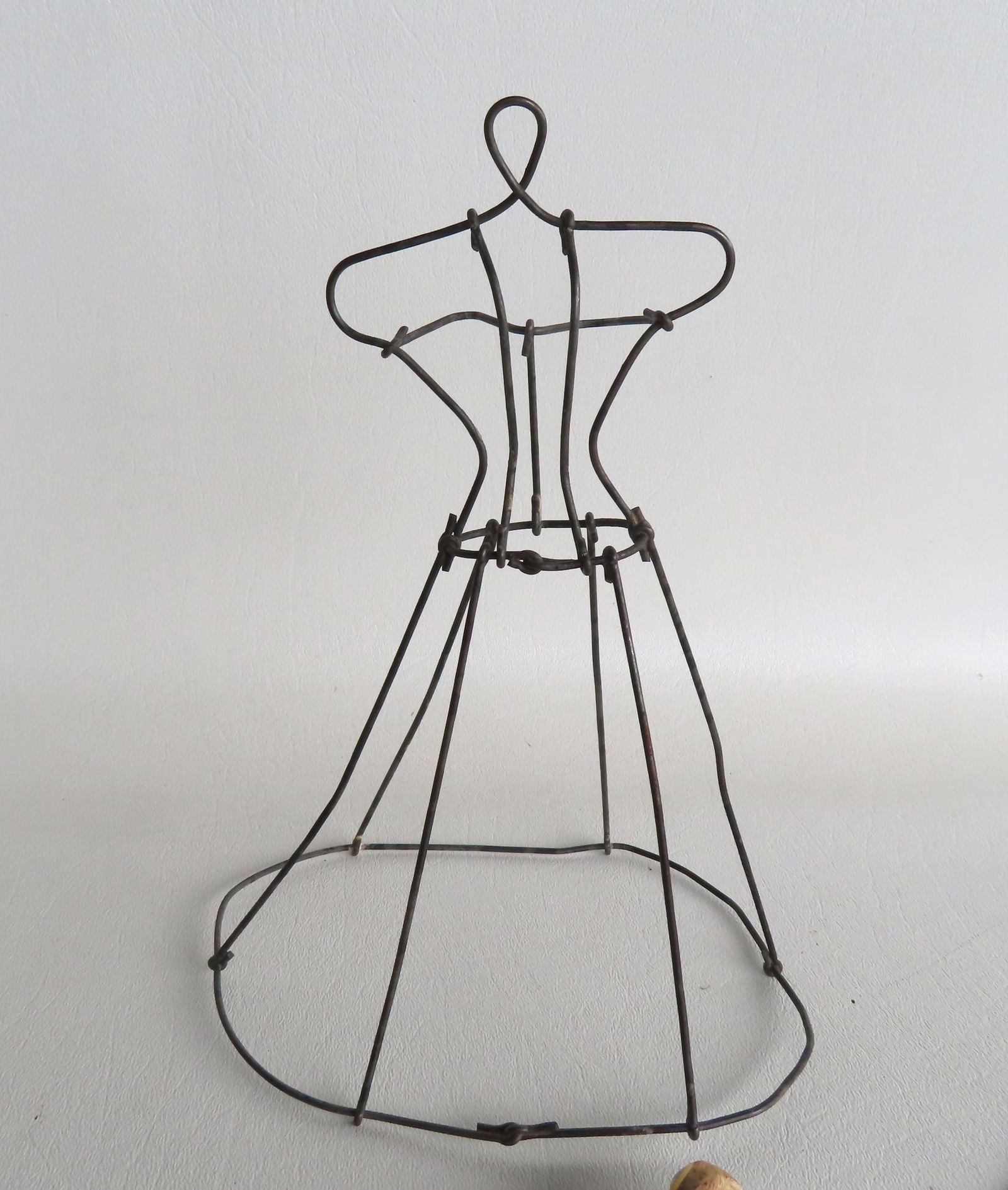 A 19th century wiire doll's dress form. . (1 of 1)