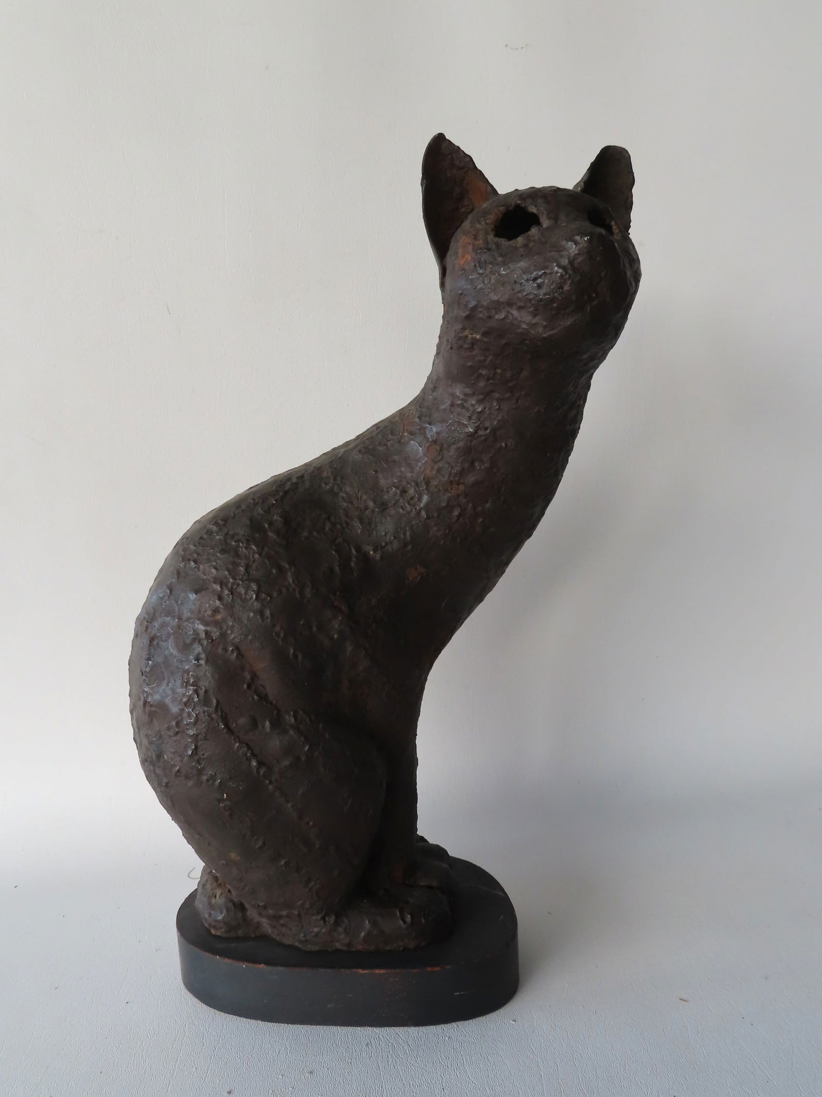 Hollow cast iron sculpture of a seated cat,  20th century, signed "Cerny" on base. Very good (1 of 6)