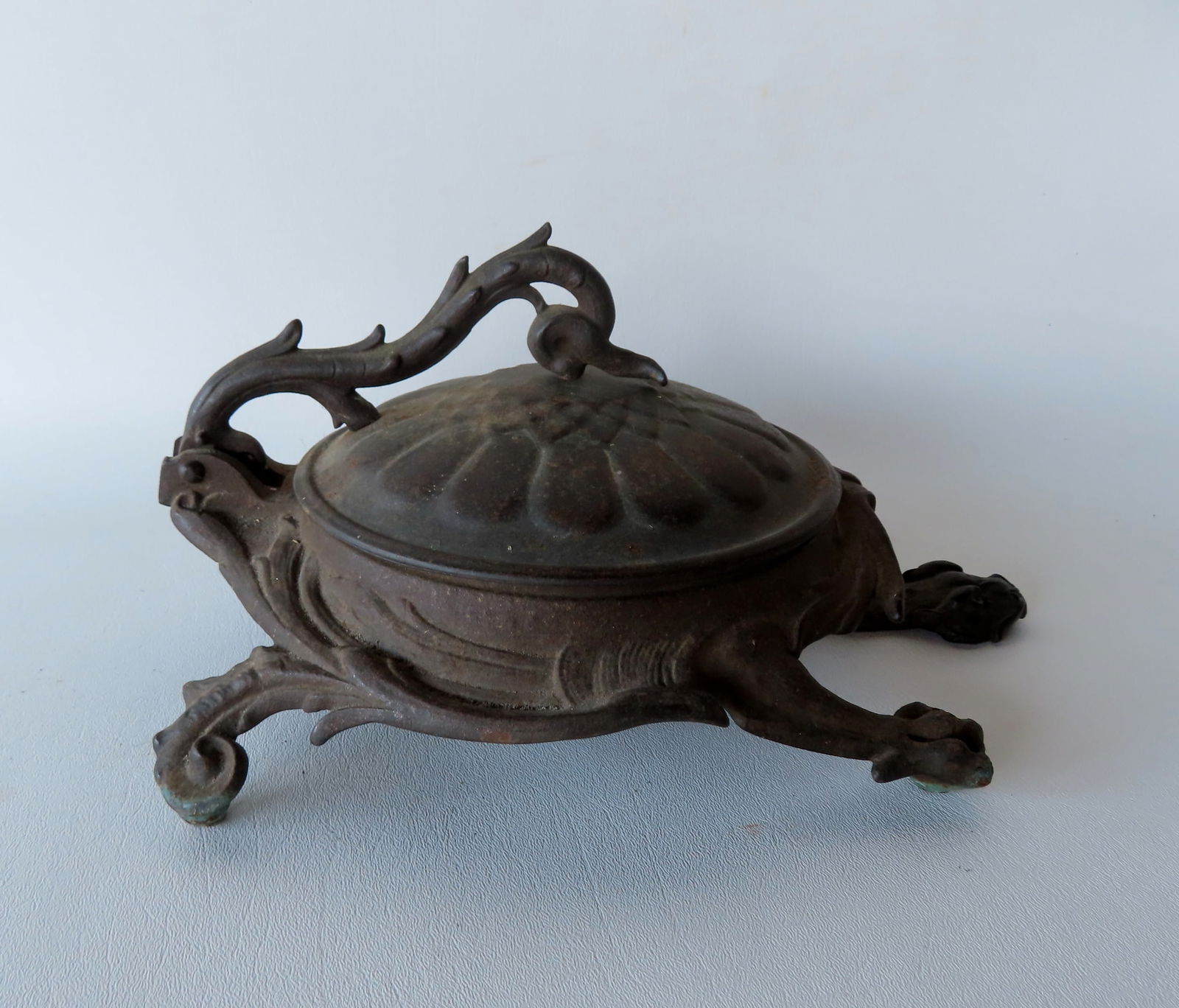 A cast iron mechanical spittoon in the form of a turtle, probably Bradley & Hubbard (marked 3812 on (1 of 8)