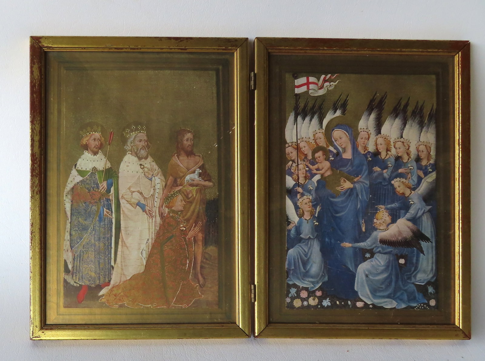 A pair of religious icon lithographs with gilded highlights, early 20th century, housed within 2: A pair of religious icon lithographs with gilded highlights, early 20th century, housed within 2 hinged fold up frames. Signed on reverse "By Hans Membling / Bought in Bruges Belgium in the 20's". The