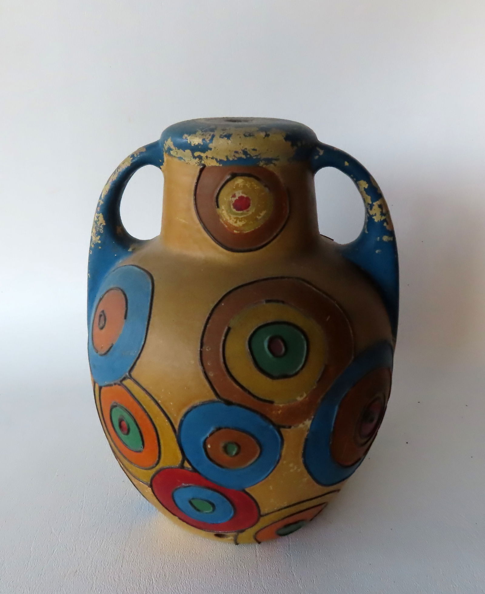 A mid-century modern pottery lamp base, circa 1950. Measures 6 1/2"W x 8 1/2"H. No electrical (1 of 4)