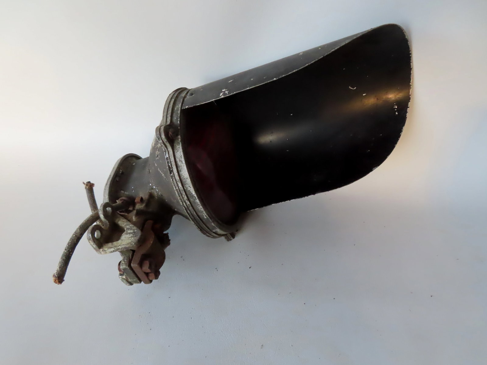 A vintage railroad gate lamp, signed "Western Railroad Supply Co. / Type R-1016 Gate Lamp, cast: A vintage railroad gate lamp, signed "Western Railroad Supply Co. / Type R-1016 Gate Lamp, cast aluminum in original paint and red lens. Some paint losses but otherwise good condition. Measures approx