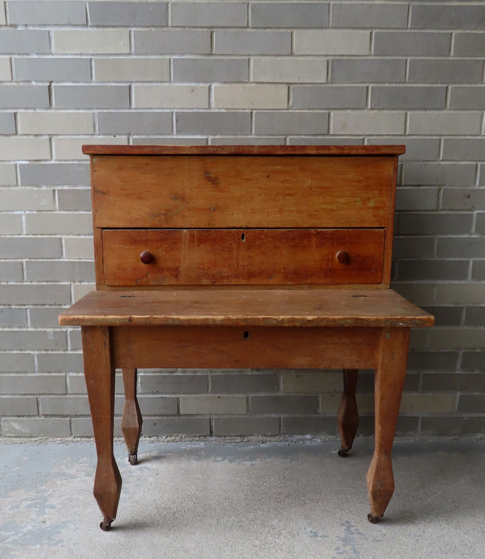 Unusual child's desk with lift top lower surface below top with upper storage compartment over lower (1 of 6)