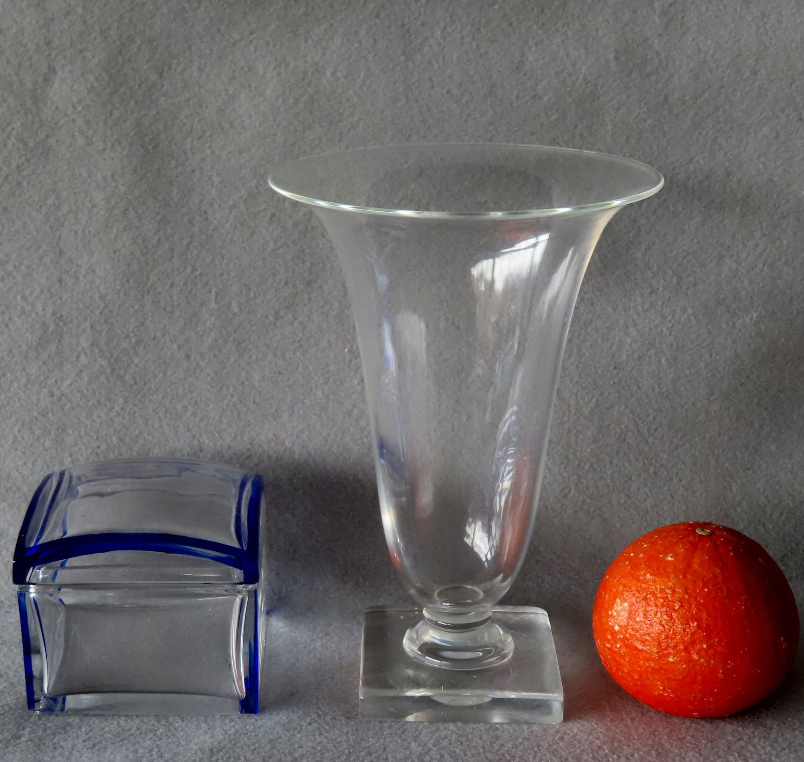A Steuben vase and Val St. Lambert dresser jar with blue glass highlights in corners. The vase with (1 of 8)