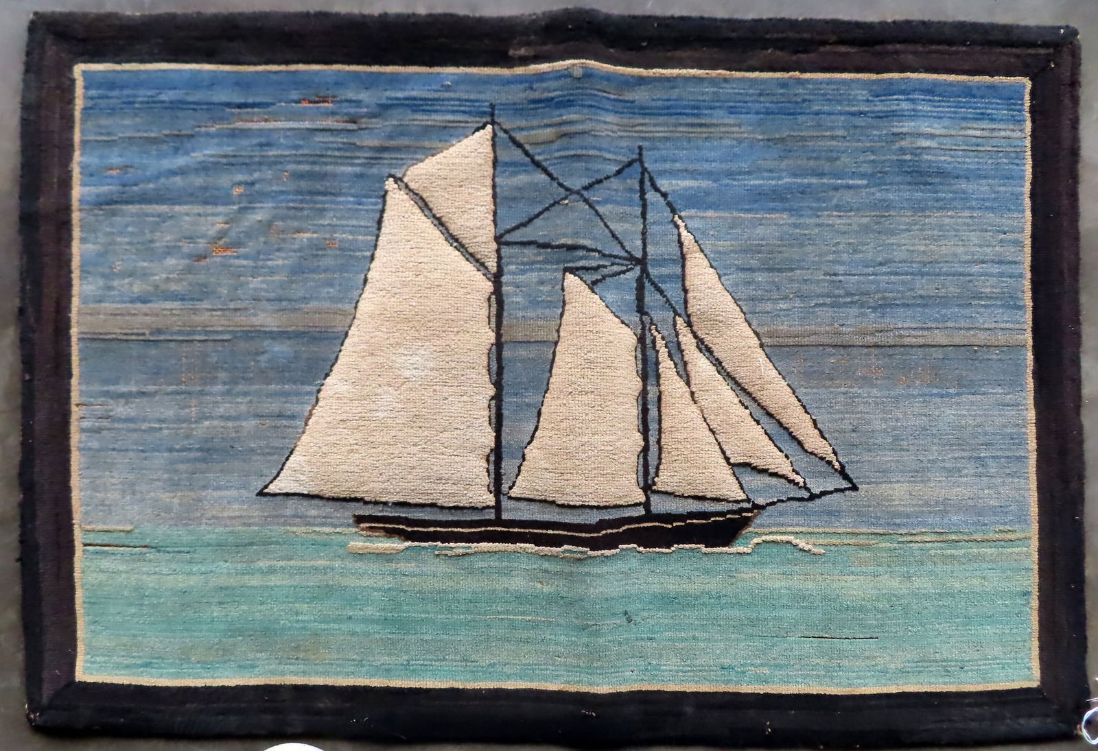 Grenfell hooked rug of sailing vessel with original label marked "Grenfell Labrador Industries" - (1 of 5)