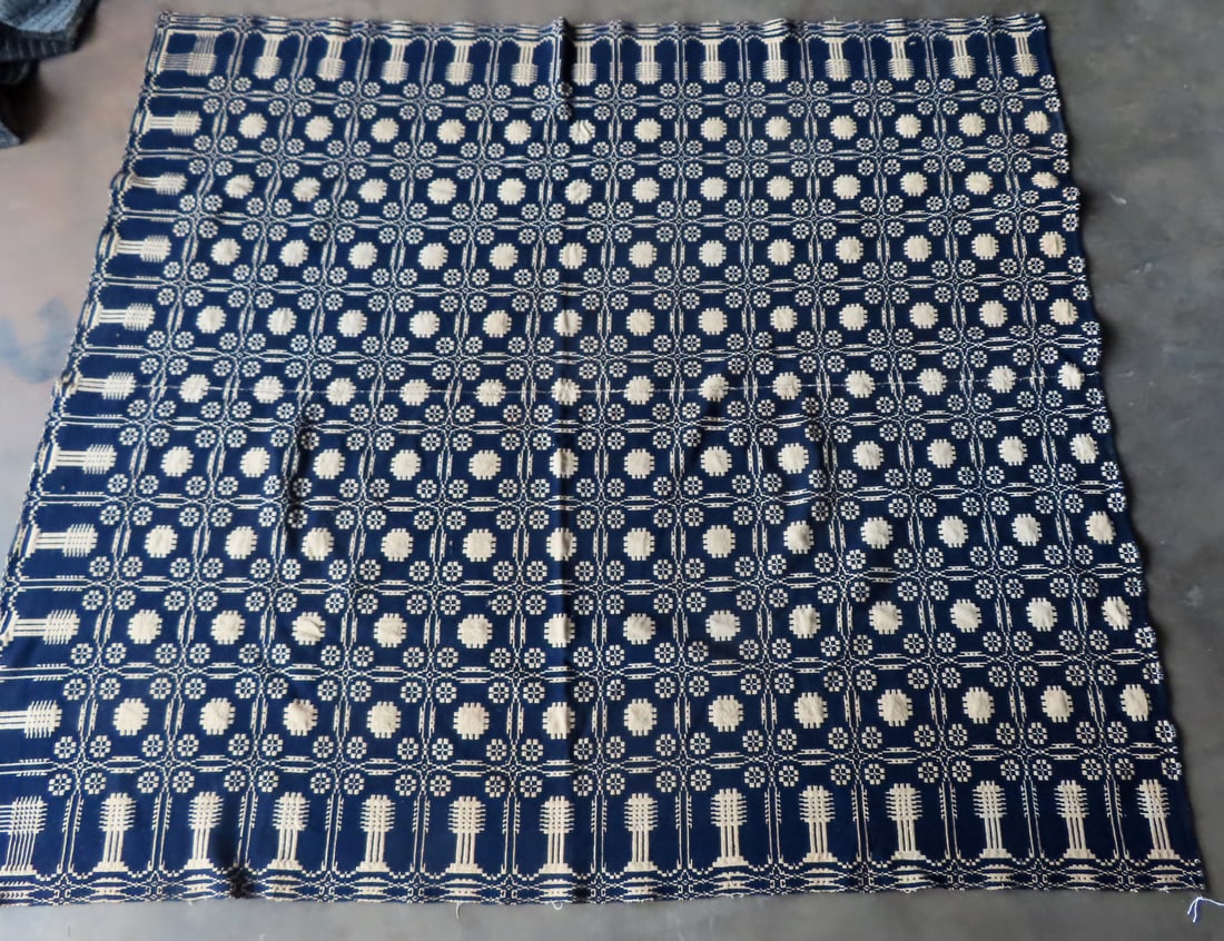An blue and white coverlet in snowflake pattern with a border of trees, 2 part, early to mid 19th (1 of 7)