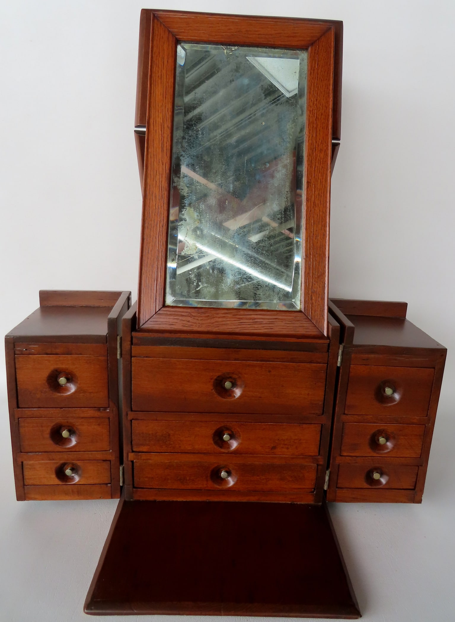 An usual lady's traveling vanity box constructed of oak and pine. When open, it has a standup mirror (1 of 8)