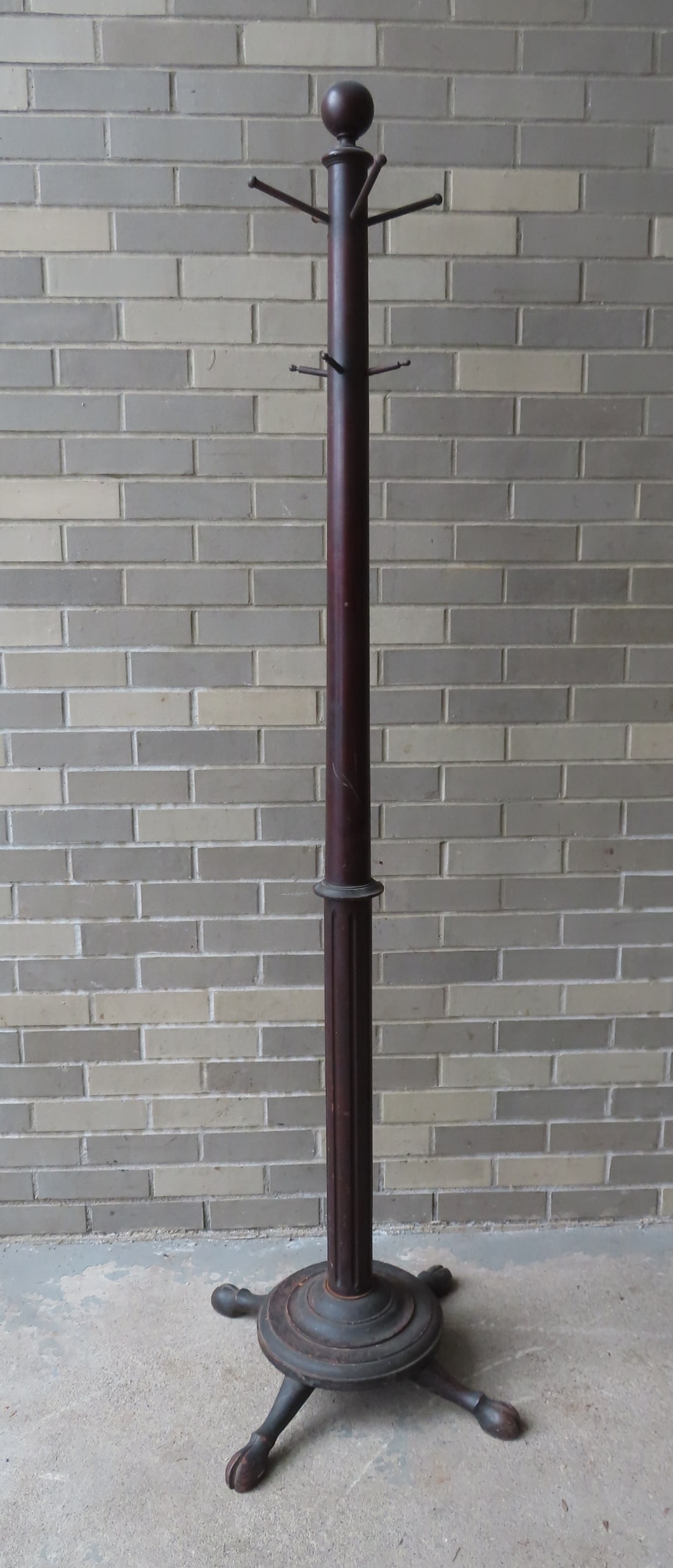 A Victorian floor standing hat/coat rack, good condition. Late 19th century. Measures 21" diameter (1 of 3)