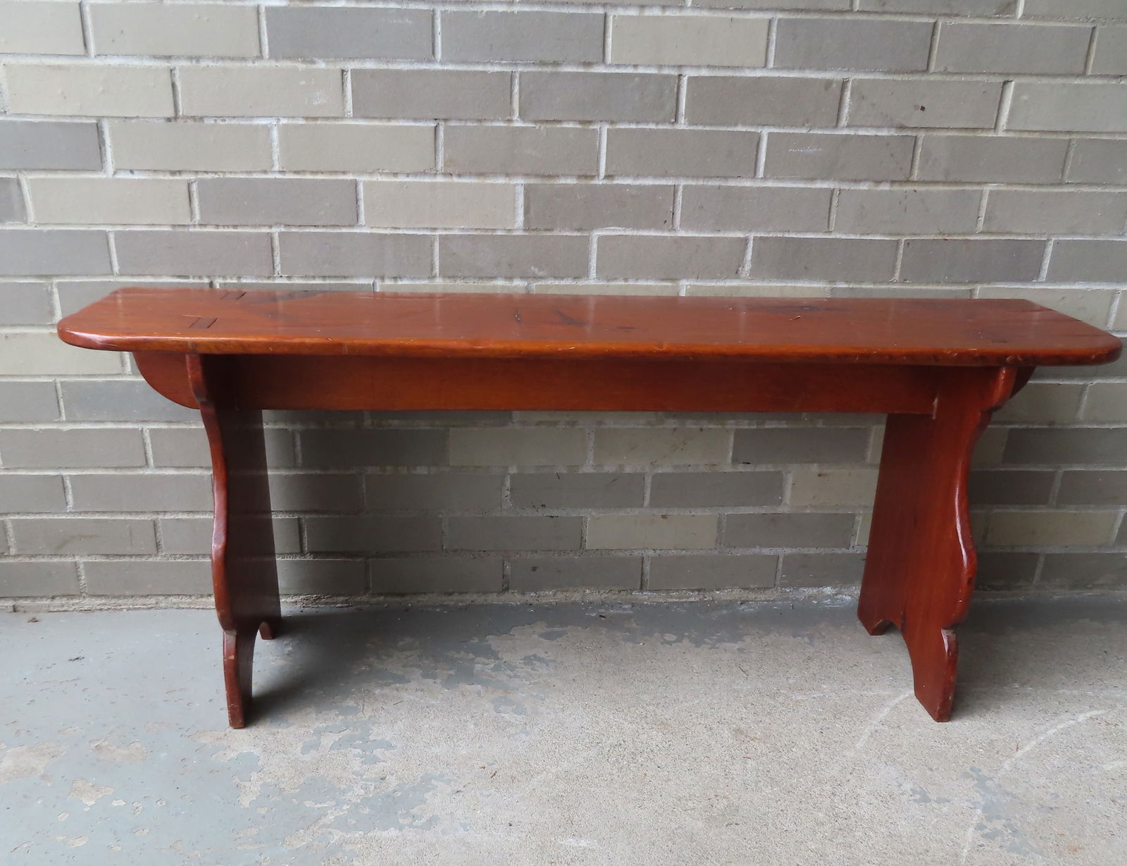 A primitive pine bench with 1/2 moon cutouts on shaped sides, mid 19th century. Refinished in very (1 of 7)