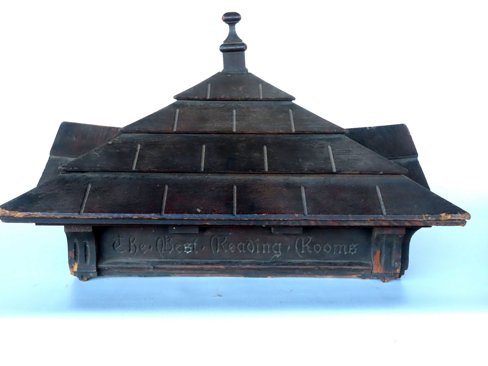 An architectural oak bookcase top marked "The Tabard Inn / The Best Reading Rooms In The United (1 of 13)