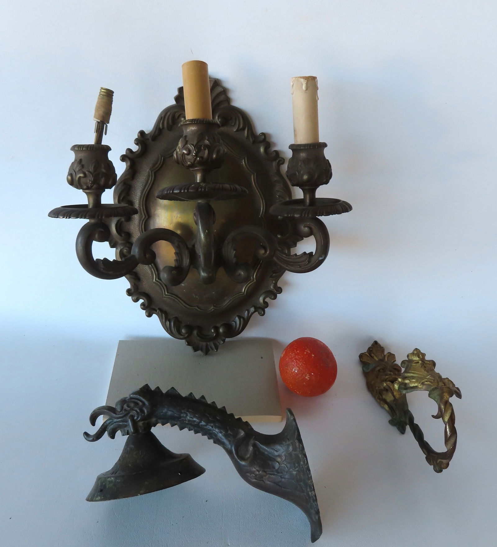 Three early 20th century decorative objects including: An ornate gilded bronze curtain tie-back (1 of 19)