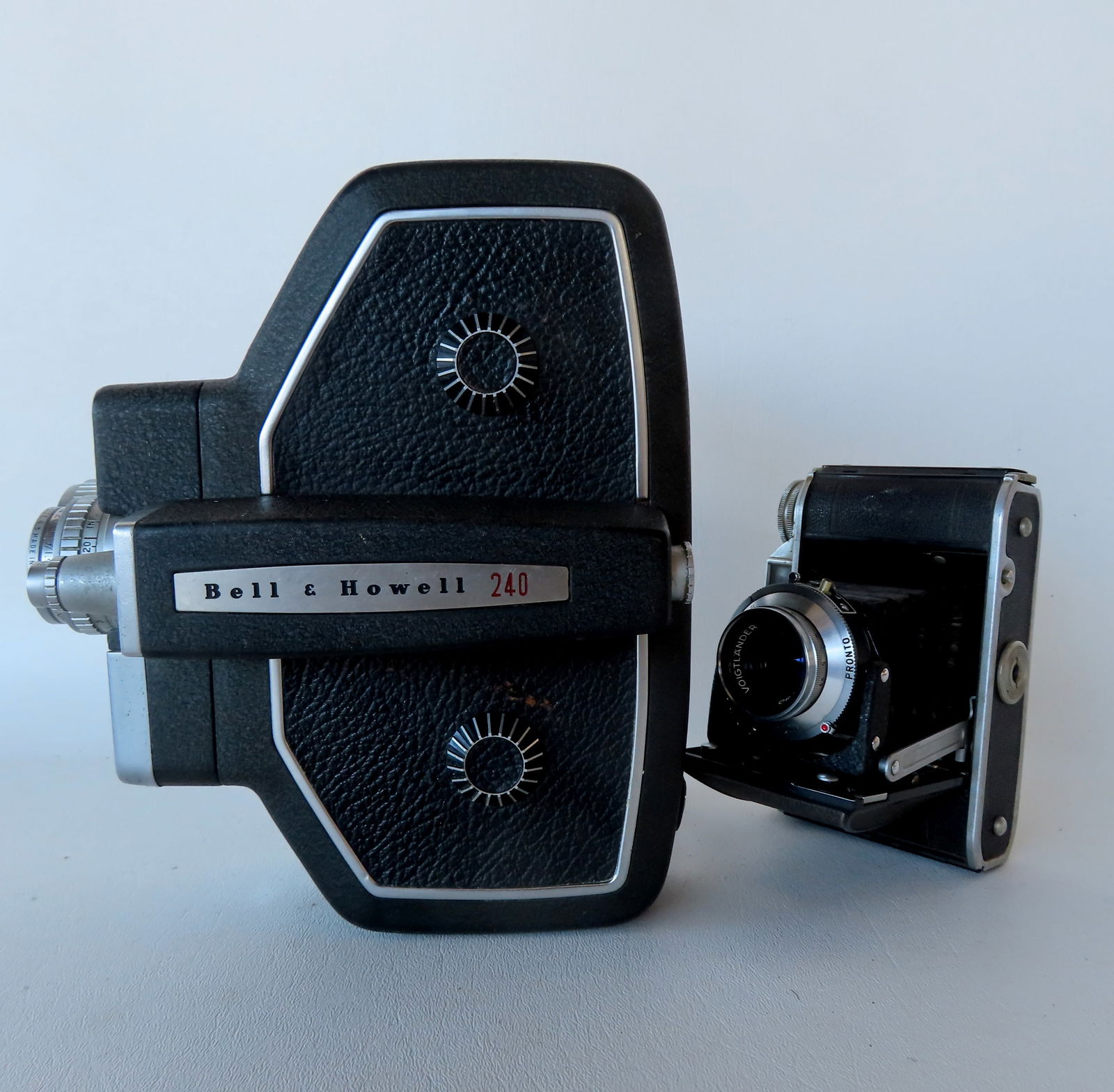 A Bell & Howell 240 movie camera, 16 MM, with automatic exposure control - appears in good condition (1 of 20)