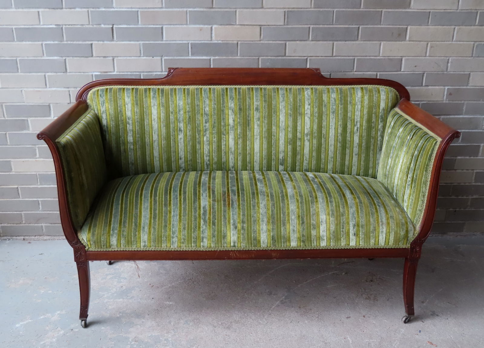 A very fine upholstered Edwardian loveseat with carved back, arms and splayed legs mounted on (1 of 8)