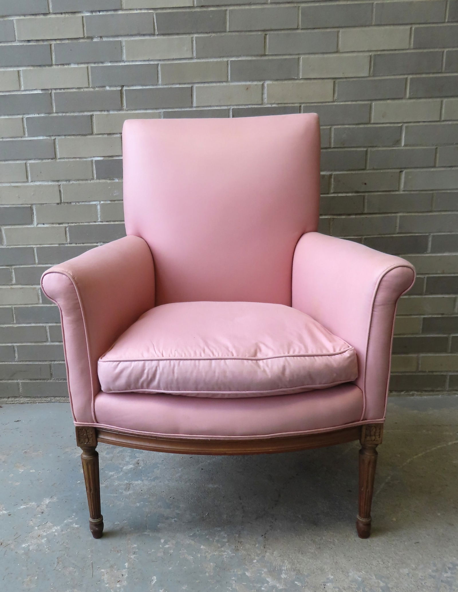 A good pink upholstered lady's French parlor chair having carved wooden rosettes above the fluted (1 of 6)