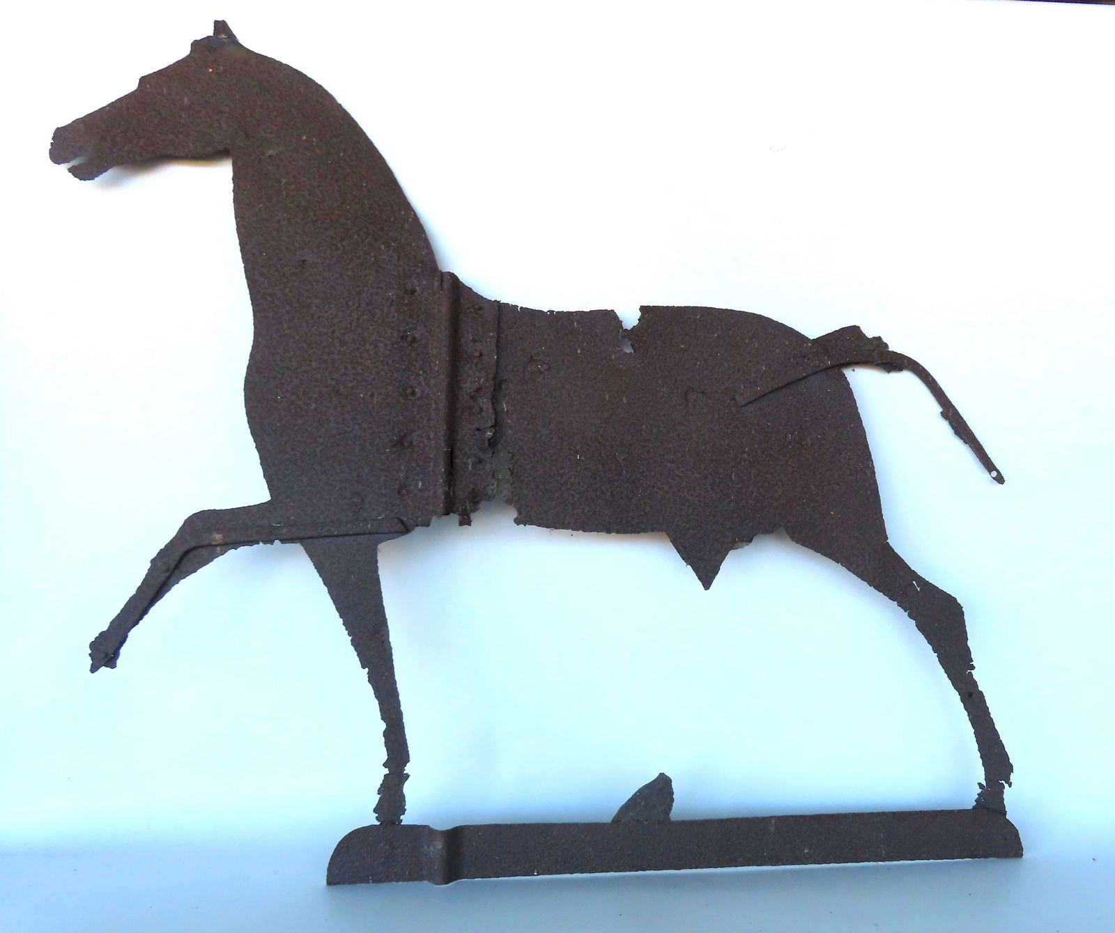 Large silhouette tin running horse weathervane with rust, old repairs and losses, early 19th (1 of 6)