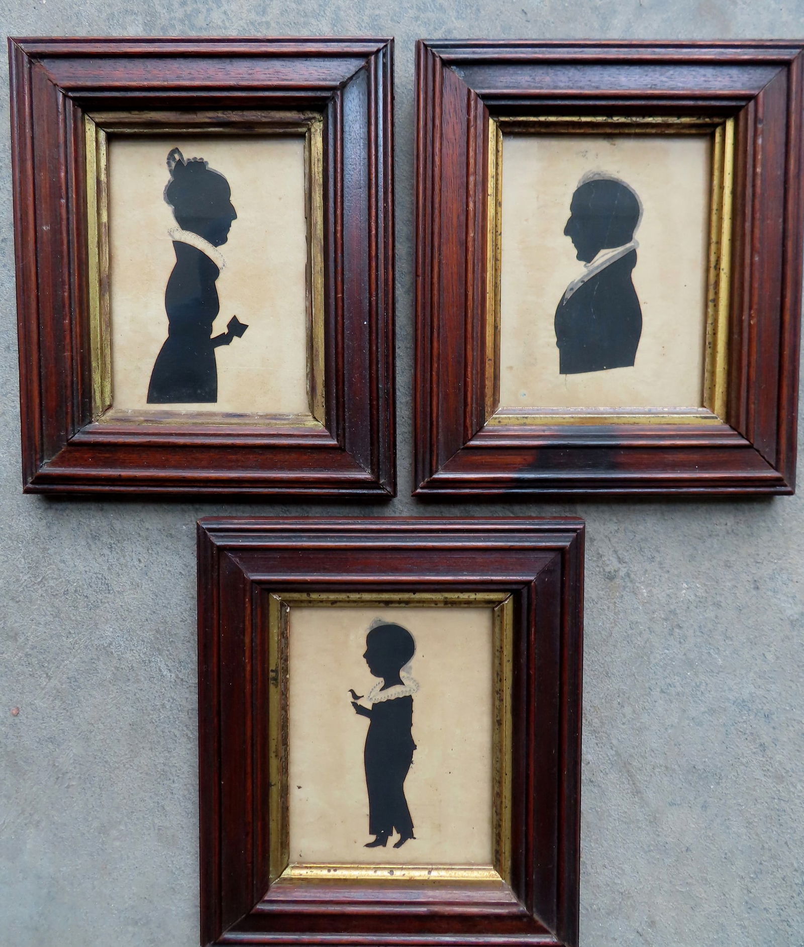 Three folk art cut paper silhouettes of 3 family members, each with water color highlights, early (1 of 13)