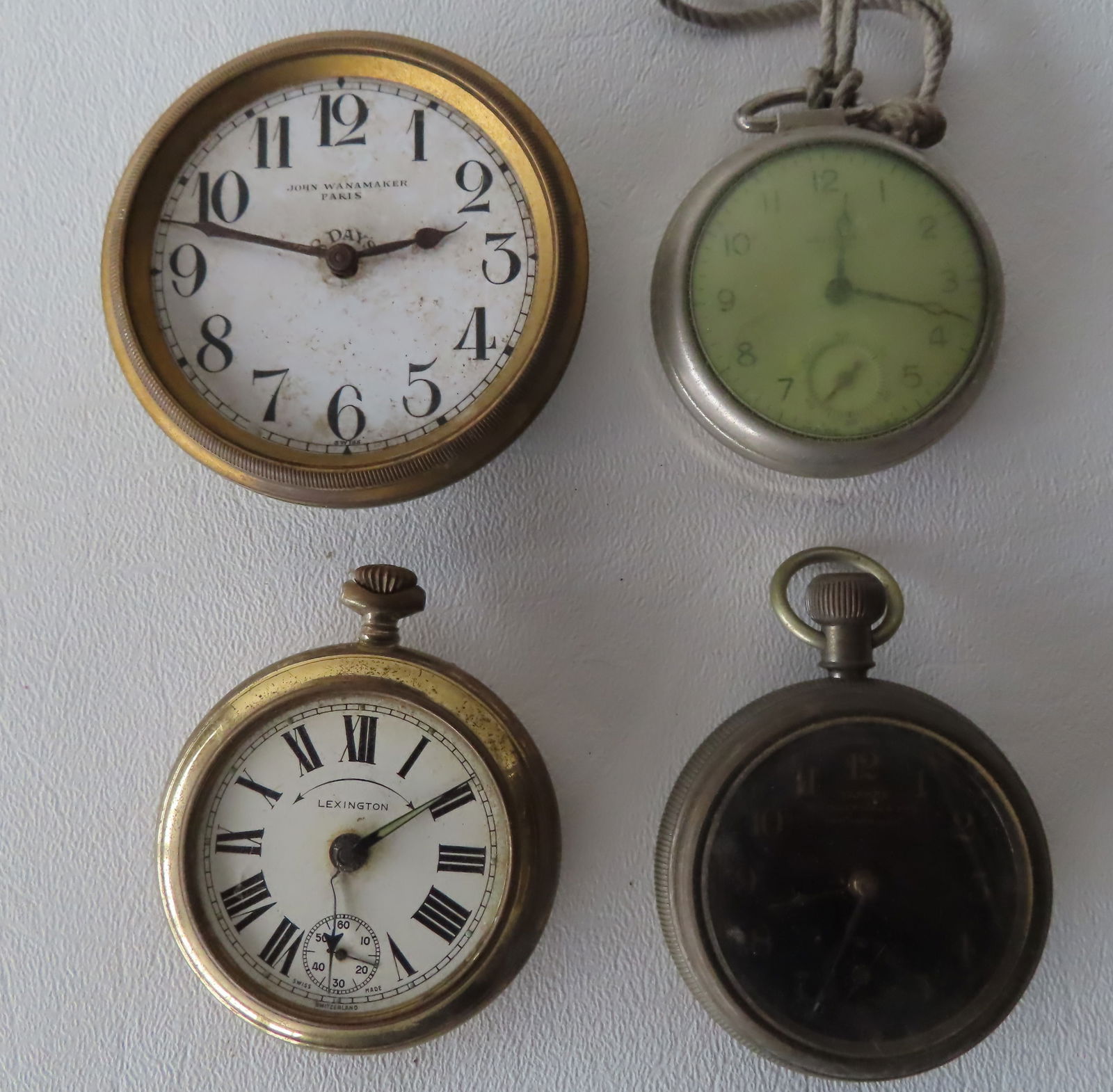 Three pocket watches and an auto clock, most early 20th century - all non-working and some needing (1 of 5)