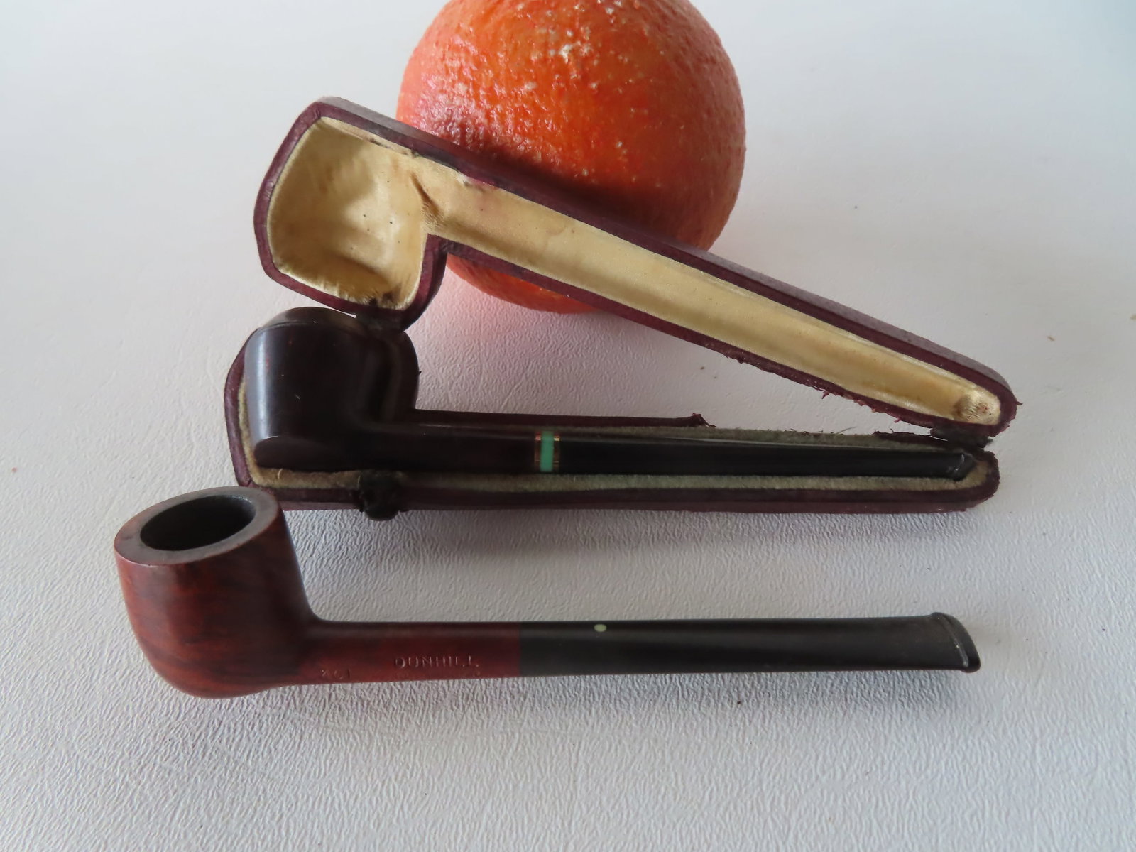 Two small high quality smoking pipes. The first in original leather case signed "Comoy's Make" - (1 of 4)