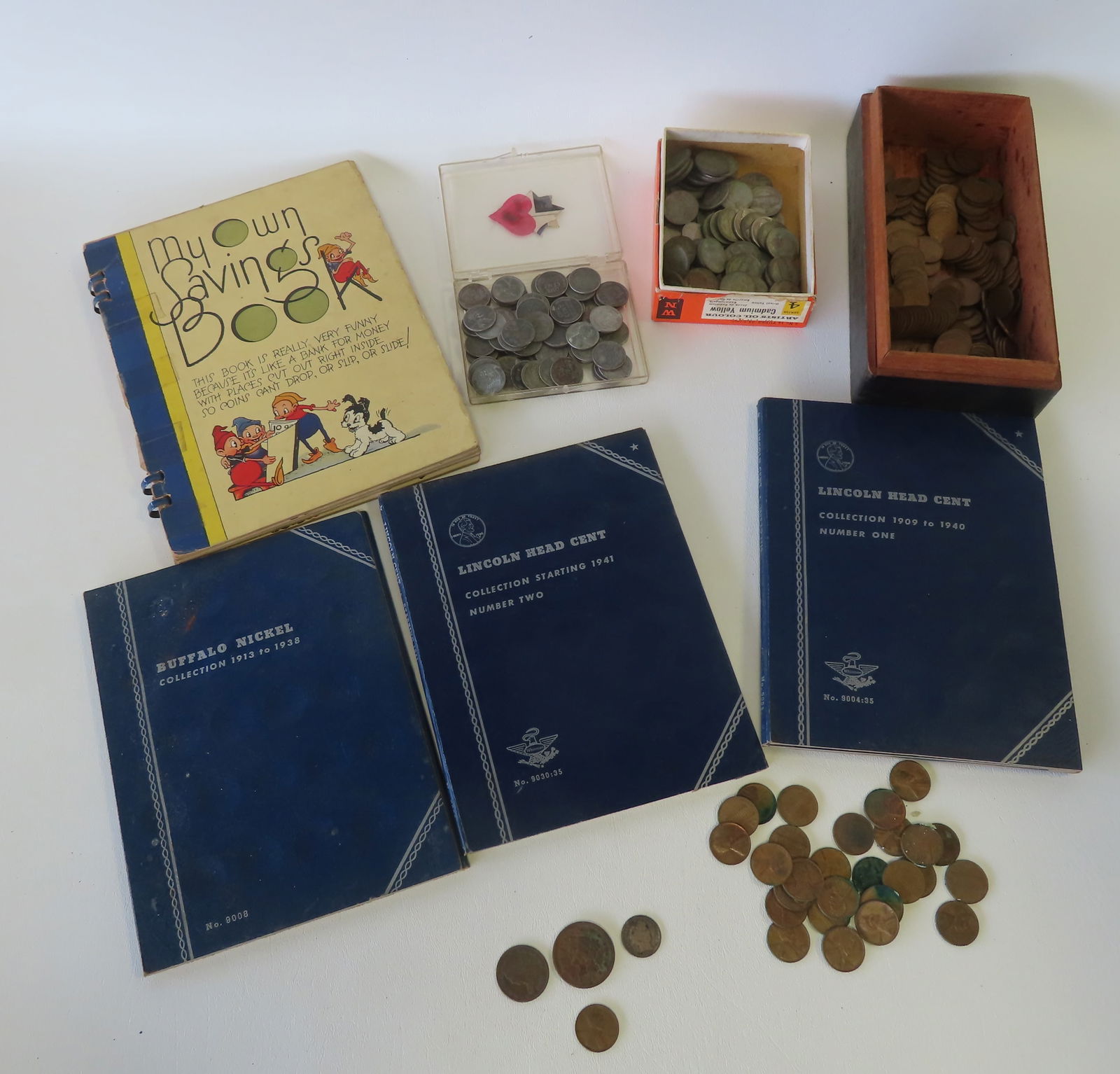 A large grouping of coins, mostly pennies and nickels, and 3 early coins,  including: A 1912 dime; (1 of 19)