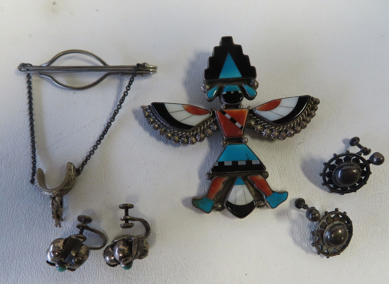 Grouping of Southwestern handmade silver jewelry including an unmarked silver and colorful polished (1 of 16)