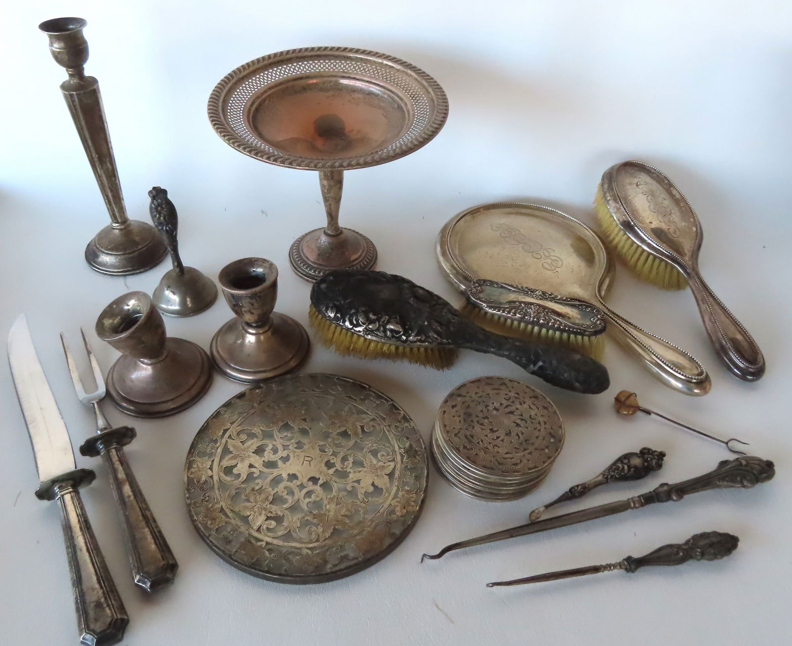 A large grouping of sterling accessories, most weighted or with sterling handles. Some pieces with (1 of 8)