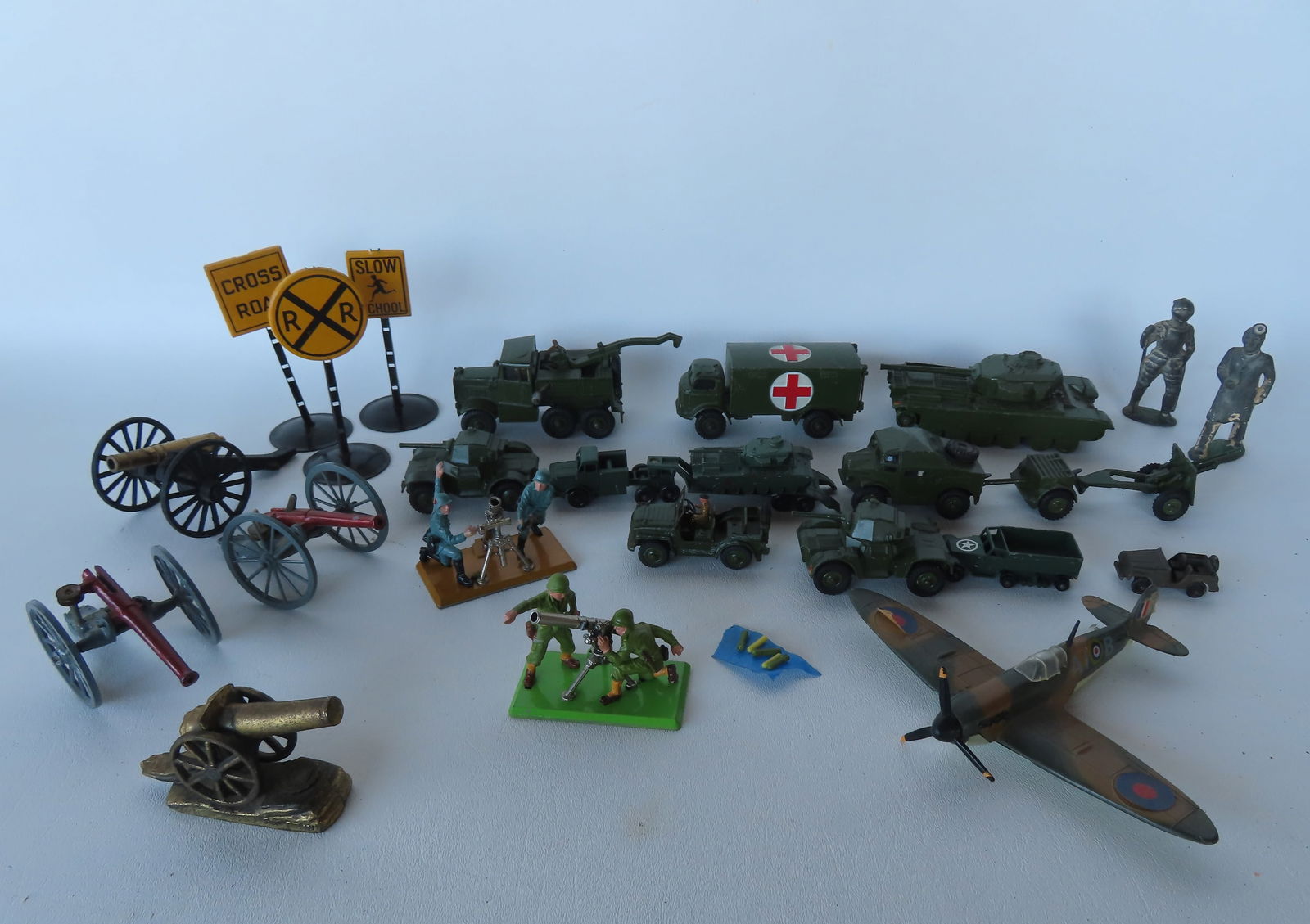 Grouping of mostly die-cast military toys, most made by Dinky. Also includes 2 Britains military (1 of 11)