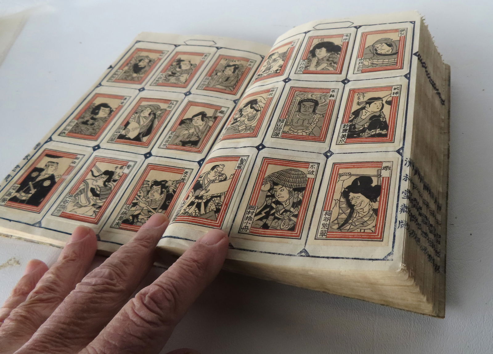 A Japanese album containing approximately 430 mostly Japanese woodblock matchbox labels, circa 1920. (1 of 19)