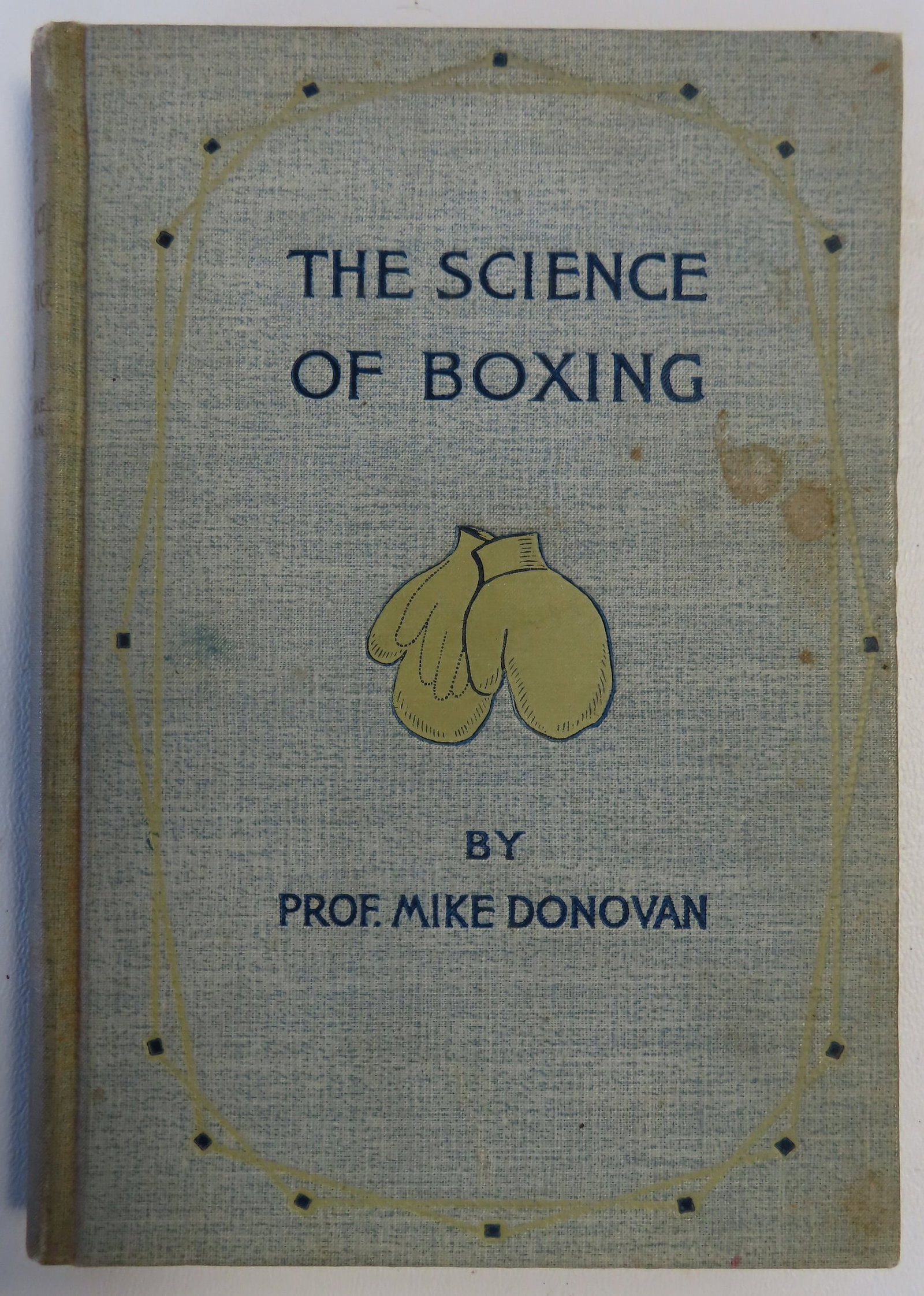 Autographed book titled "The Science of Boxing" by Prof. Mike Donovan, first edition 1893. Inscribed: Autographed book titled "The Science of Boxing" by Prof. Mike Donovan, first edition 1893. Inscribed in pen and ink to "Miss Bird / from yours truly / Mike Donovan". Prof. Donovan was an "Ex-Middle-We