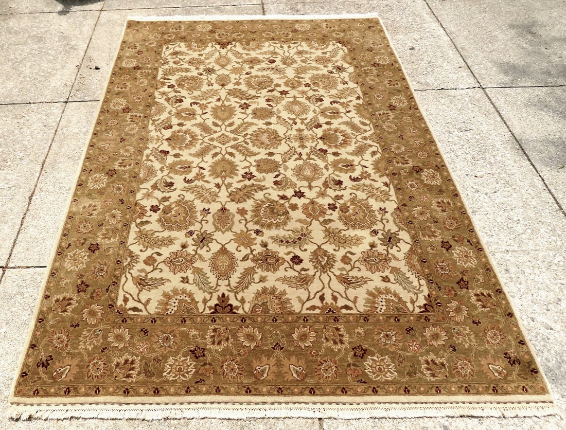 A small hand made wool oriental room size rug with fringe, late 20th c. (1 of 6)