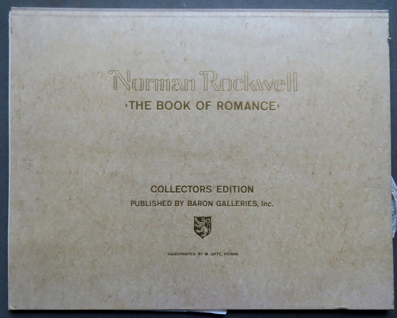 Norman Rockwell portfolio of prints "The Book Of Romance" - Collectors Edition.: Norman Rockwell portfolio of 5 colored lithographs titled "The Book Of Romance". The cover of the portfolio marked "Collectors Edition / published By Baron Galleries, Inc." - Hand printed by M. Jaffe,