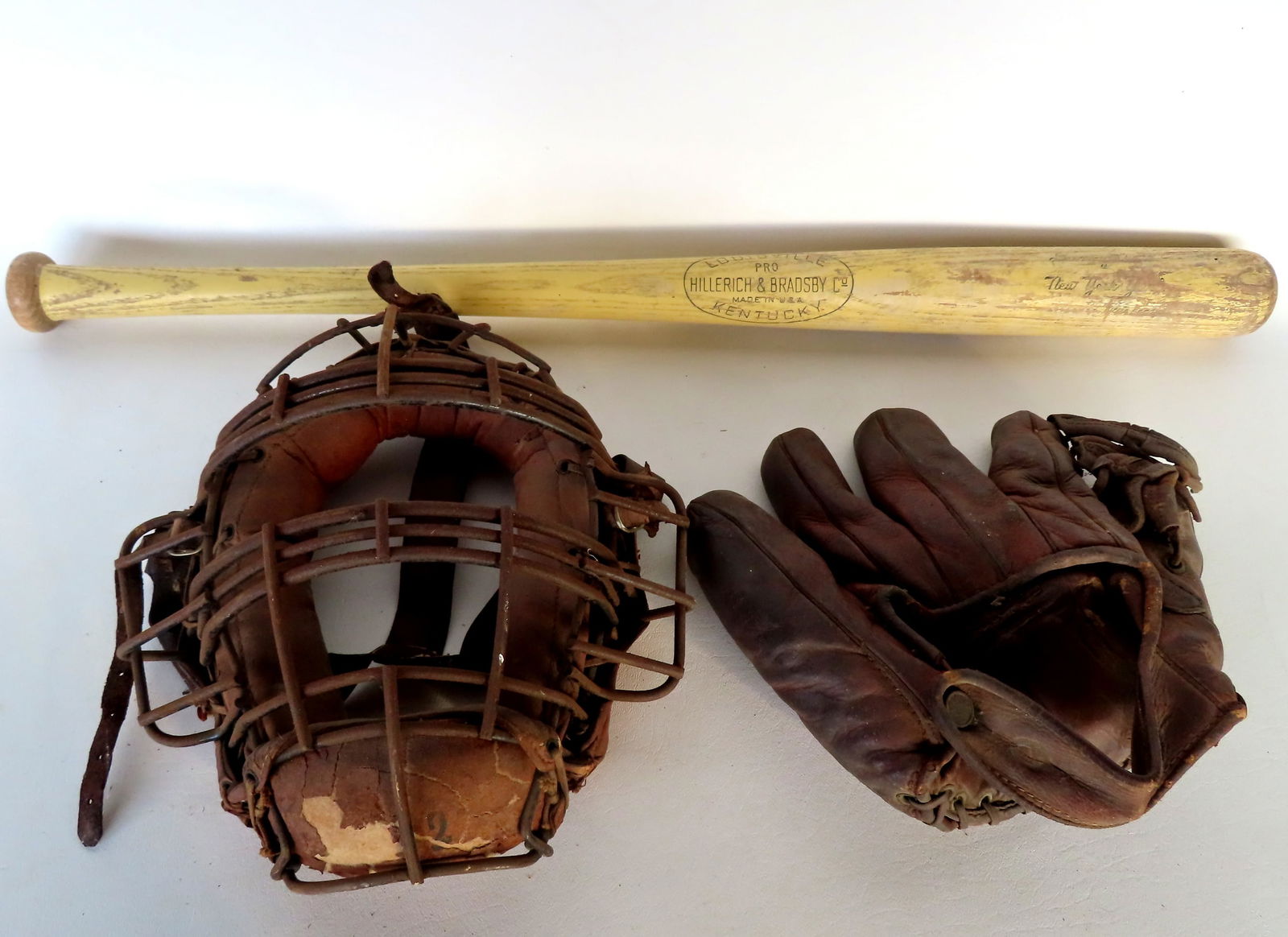 Three baseball collectibles including boy's Joe DiMaggio baseball glove. (1 of 11)