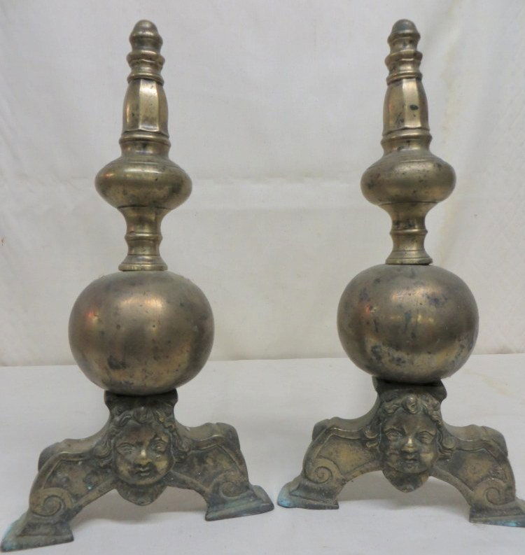 Pair of French 17th century bulbous brass andirons: Pair of French 17th century bulbous brass andirons with faces on base and original hand wrought iron dogs. 17"H - Provenance: From a private Kingston NY collection.